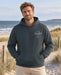 Unisex Oversized Hoodie Beach Club Amalfi Teal – Vorderansicht am Model